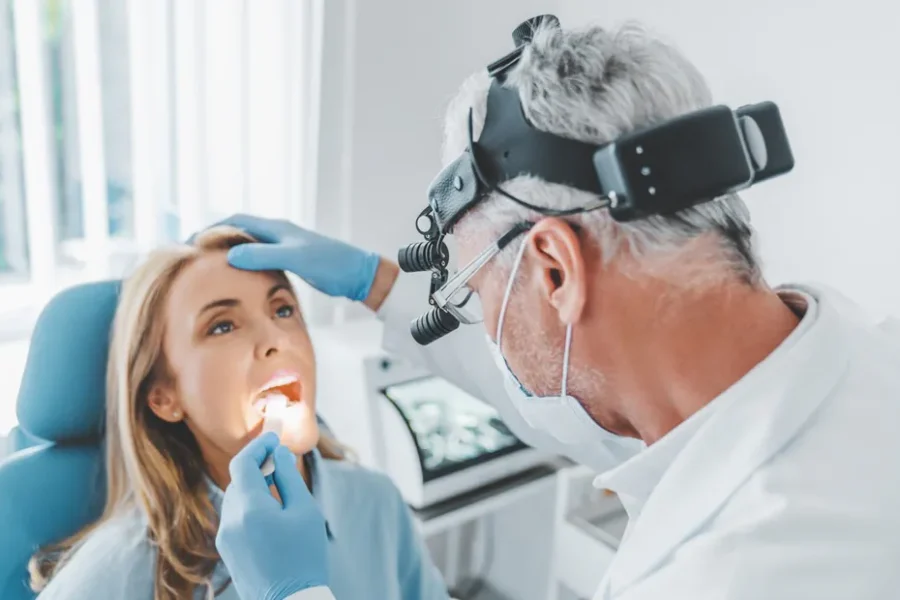 examining throat infection