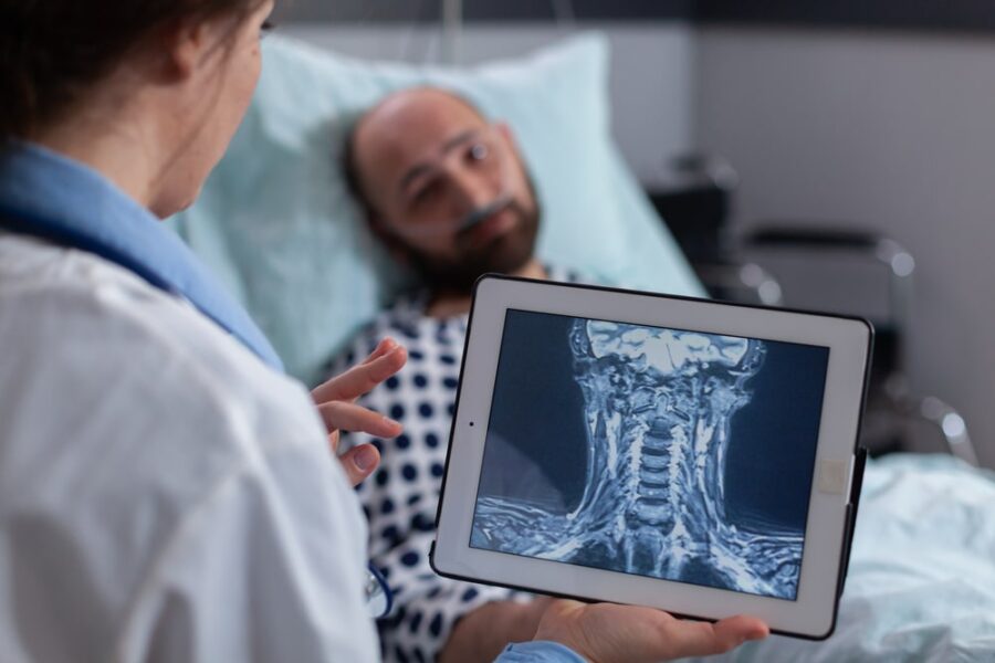 Physician examining digital x-ray