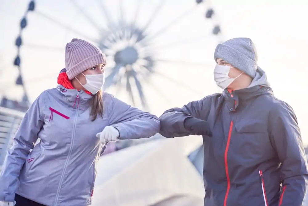 adult couple jogging in the city