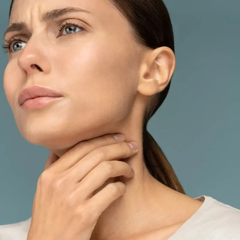 woman having a sore throat