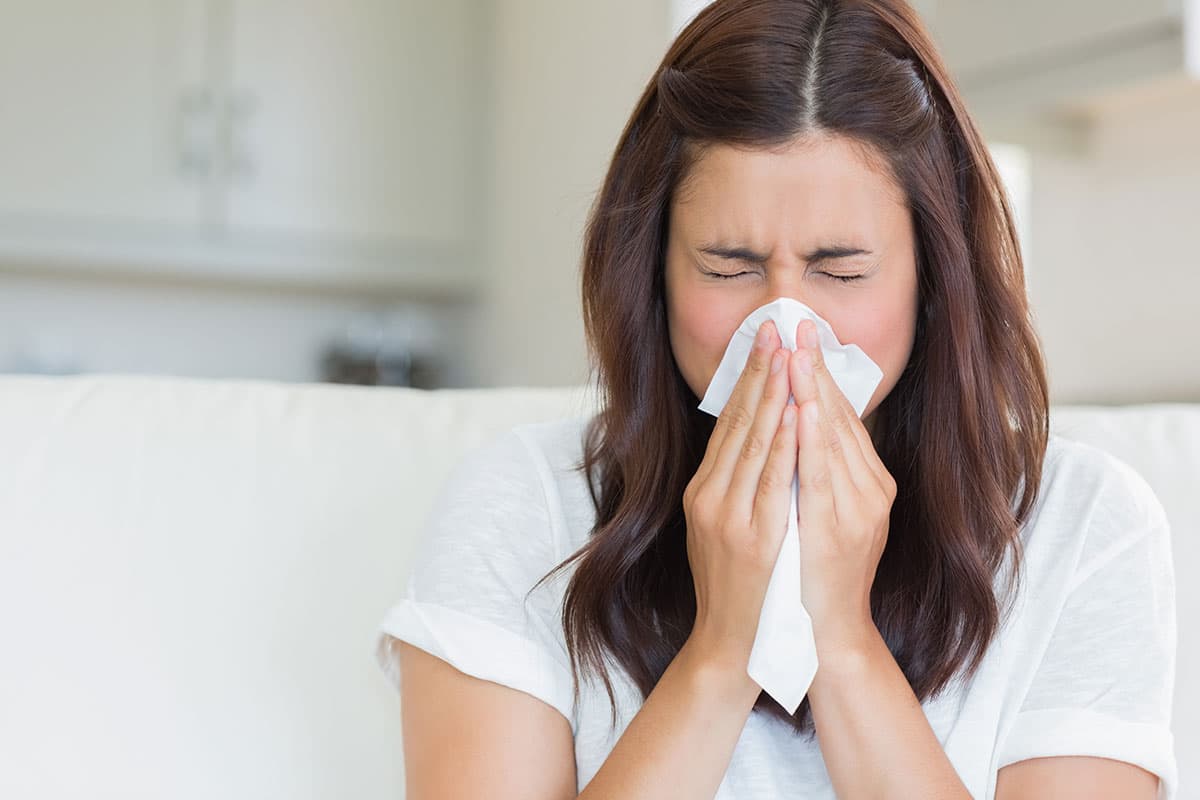 Patient being evaluated for flu symptoms at Advanced Urgent Care of Pasadena